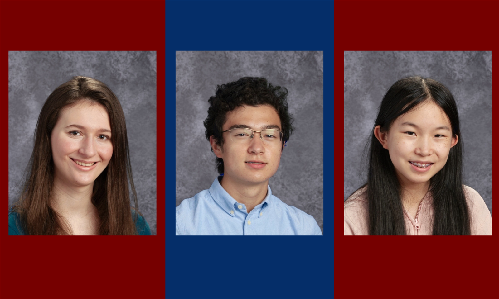 Three students smile